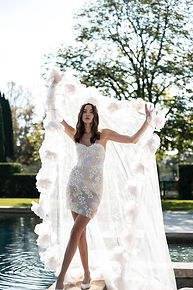 Editorial-style wedding photo of bride by the pool in Chateau De Tourreau in South Of France, captured by Anastasia Rassia