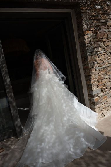 Wedding dress textures at Lazarou Beach with Mediterranean aesthetic