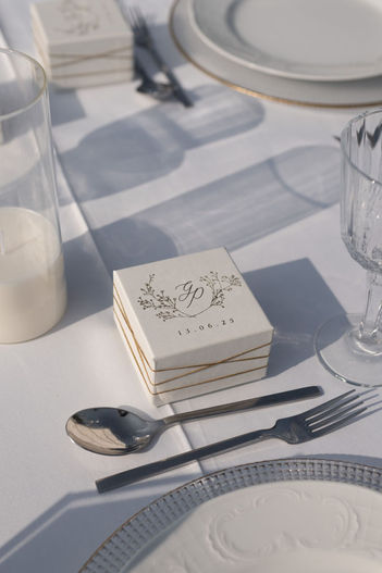 Elegant outdoor wedding setting with colorful accents at Golf Privé Glyfada