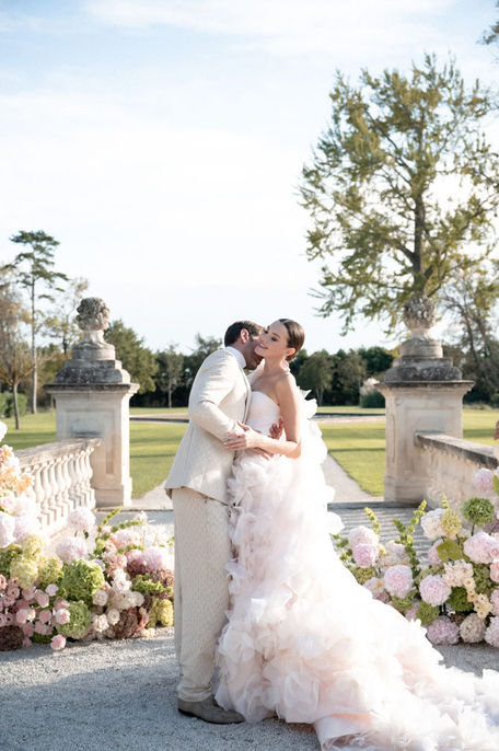 Bride and groom intimate moment at Château de Tourreau gardens in Provence