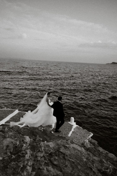 Bride and groom portrait at Lazarou Beach wedding venue in Sifnos