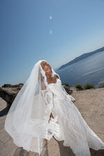 Luxury Santorini wedding photographed by Moments To Keep by Anastasia Rassia