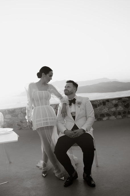 Sunset portraits on Santorini terrace, destination wedding photographer Greece
