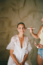Bride getting ready at Lazarou Beach shot on film 35mm