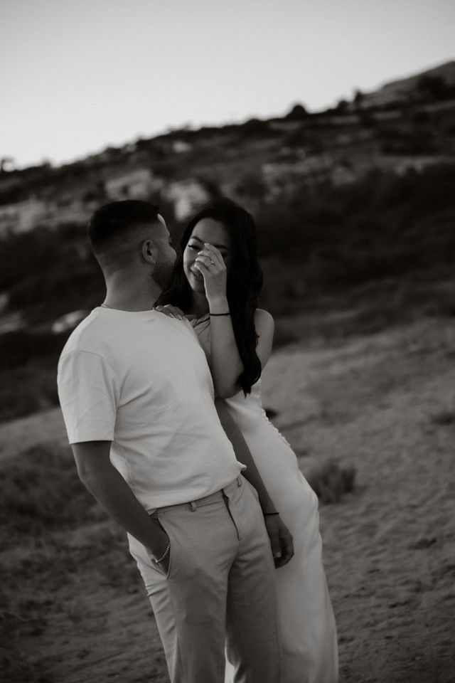 Intimate couple moment in Athens captured in a natural engagement photography style