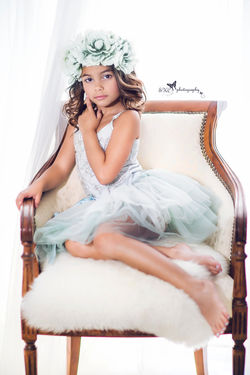 children photography girl in pastel teal dress gown sitting on the chair model atlanta studio photog