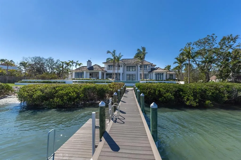 Panoramic view from second-story balcony overlooking the private dock