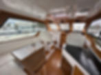 Thumbnail: 2023 True North 34 OE with Twin Suzuki 300 Salon facing forward