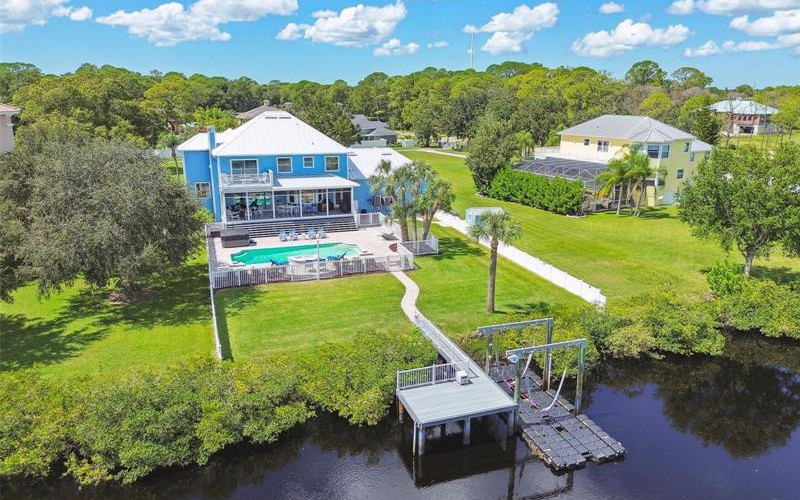 Aerial view of 8107 Sierra Manor Lane showcasing expansive water frontage
