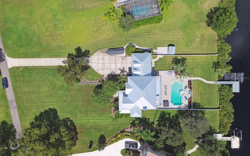 Aerial view of 8107 Sierra Manor Lane showcasing expansive water frontage