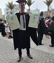 Graduation ceremony where Alex Nelson holds two degrees