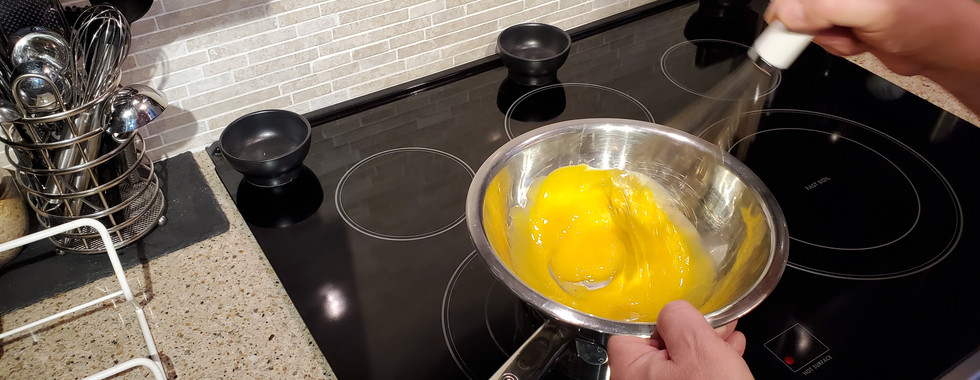 Return bowl to steaming pot while whisking.