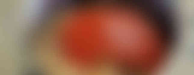 Tomato sauce added to pot of beans