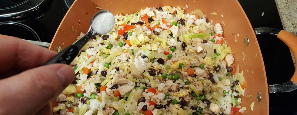 Adding MSG to the frying pan and sautéing