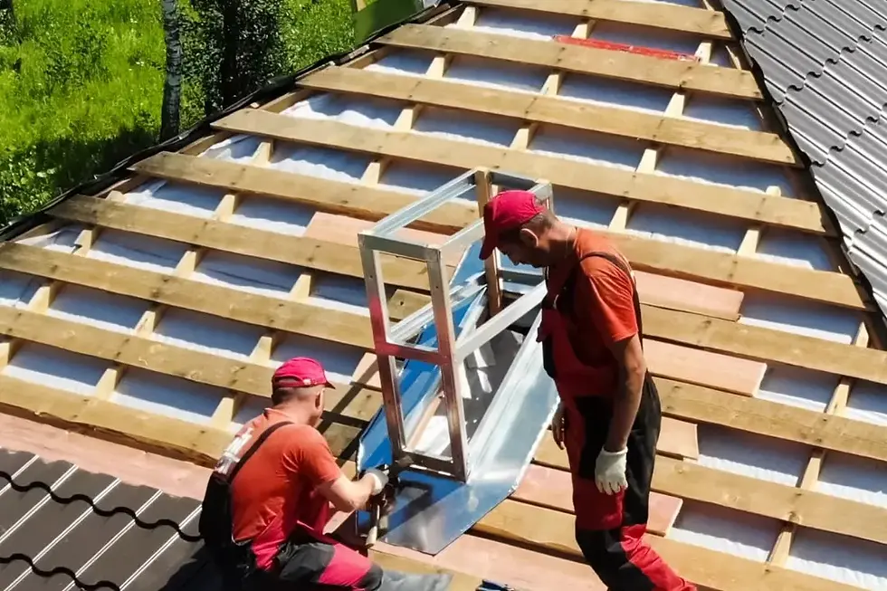 Roofing contractors installing a metal roof frame during a roof replacement in Concord, CA, ensuring precise alignment and durable structural reinforcement for long-term performance.
