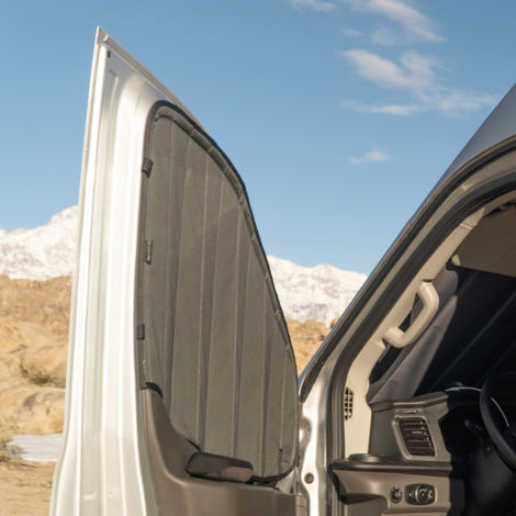 Van window shade installed in vehicle