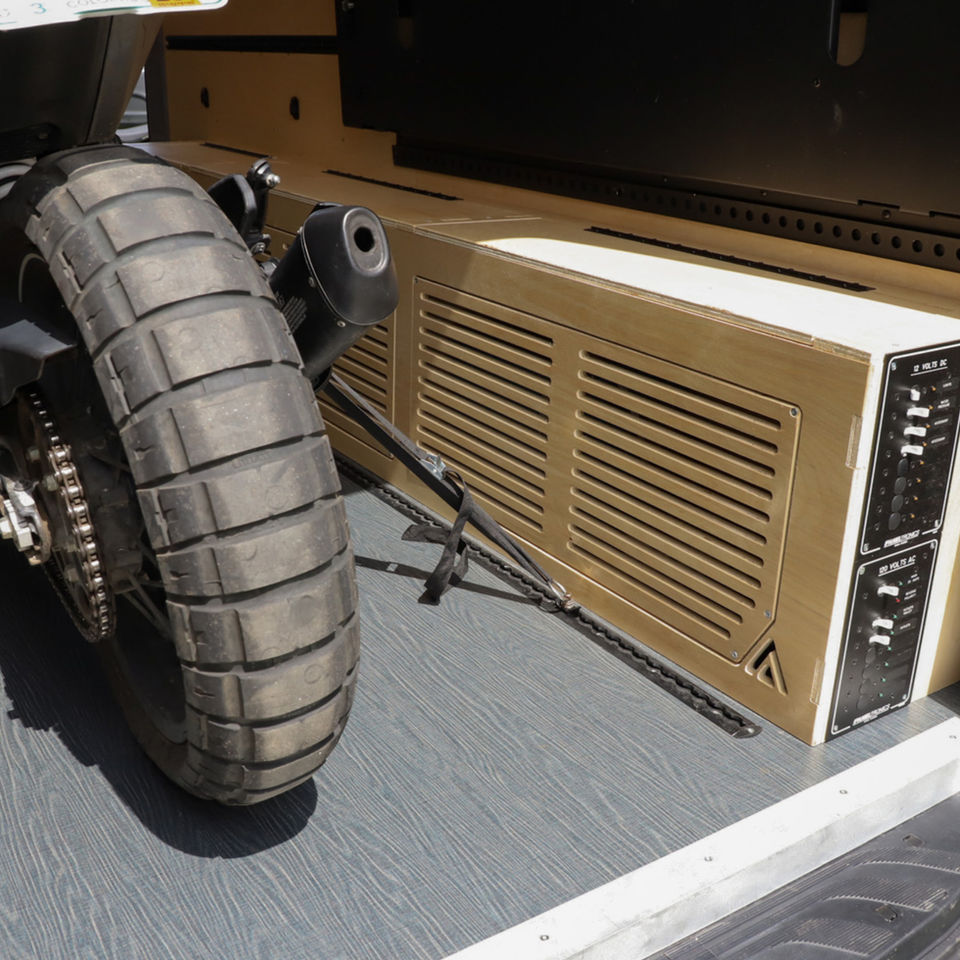 Motorcycle wheel, storage box, control panel, van conversion