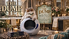 Fluffy cat in sunglasses on a modern litter box for The Dump Reviews.