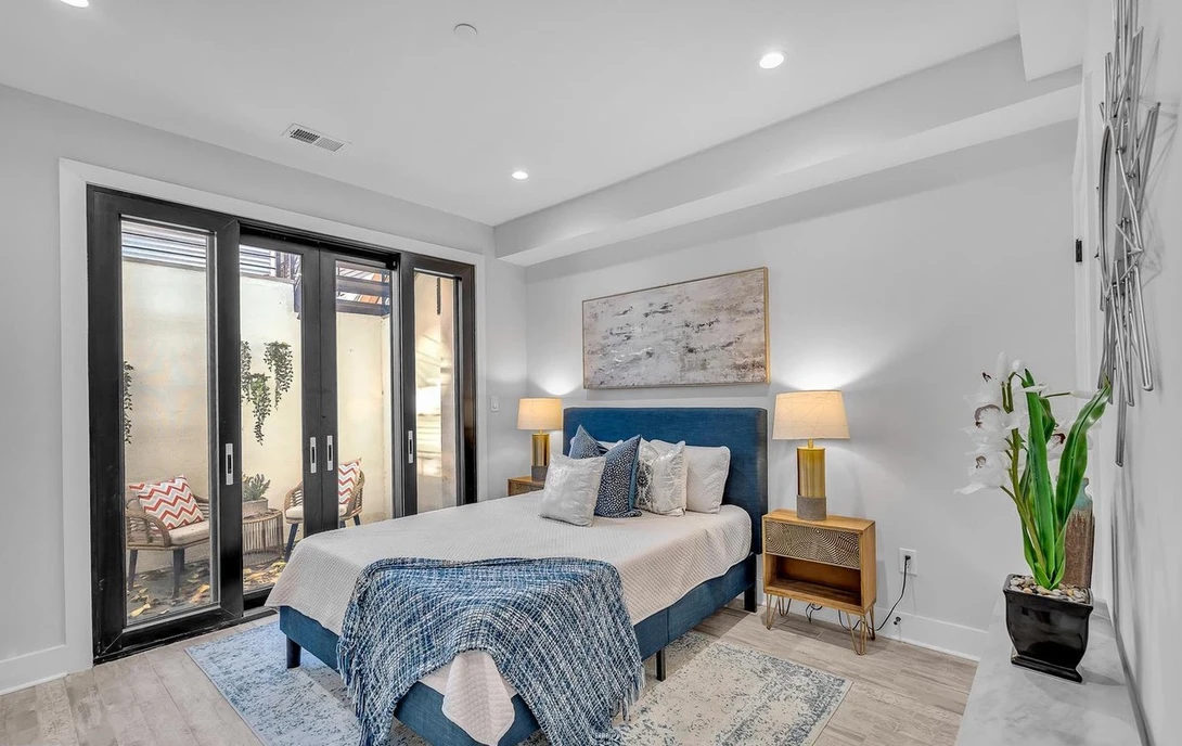 professionally staged bedroom in blue hues