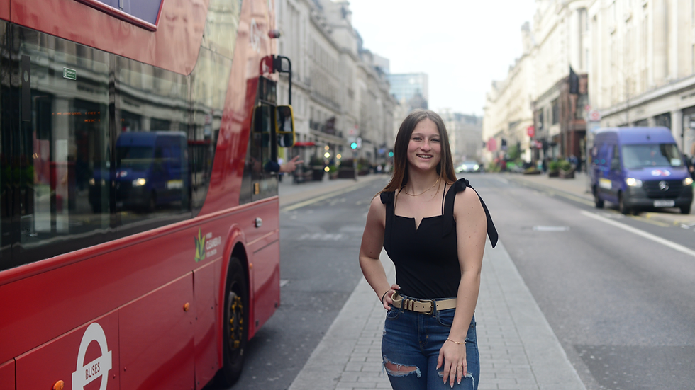 Girl standing on London street in a photoshoot