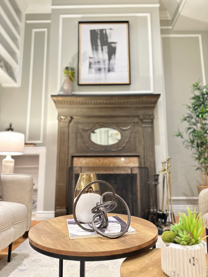 elegant living room with staged accent pieces