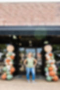 Julie Sivley in front of store front