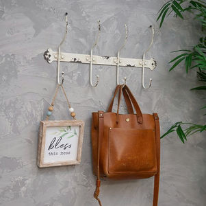 Is The Aged Metal 4 Hook Wall Rack The Perfect Rustic Storage Solution For Your Home?