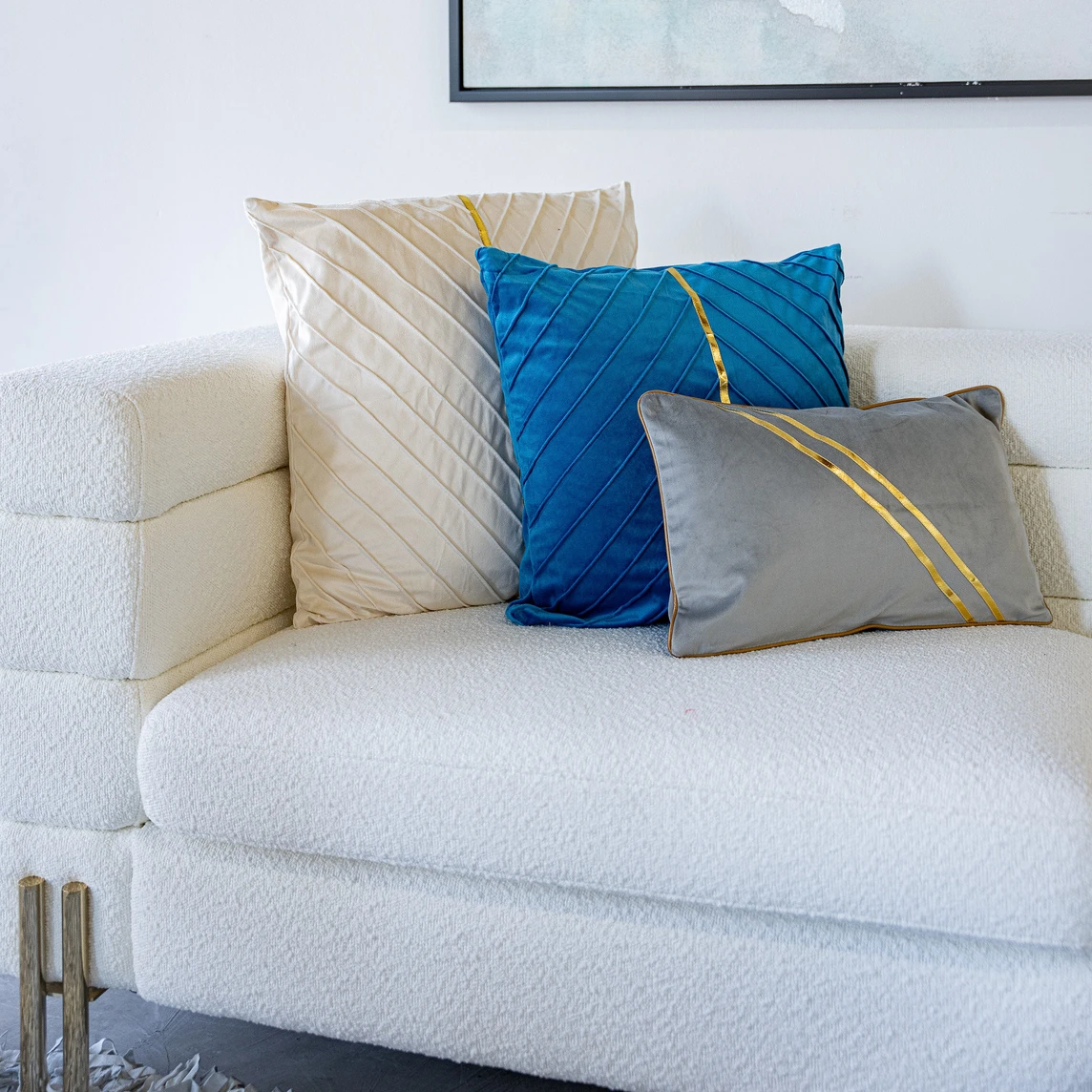 bright airy couch with pillows