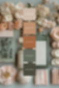 Pastel floral flat lay with bottles, flowers, and swatches; center palette shows hex codes on stacked cards.