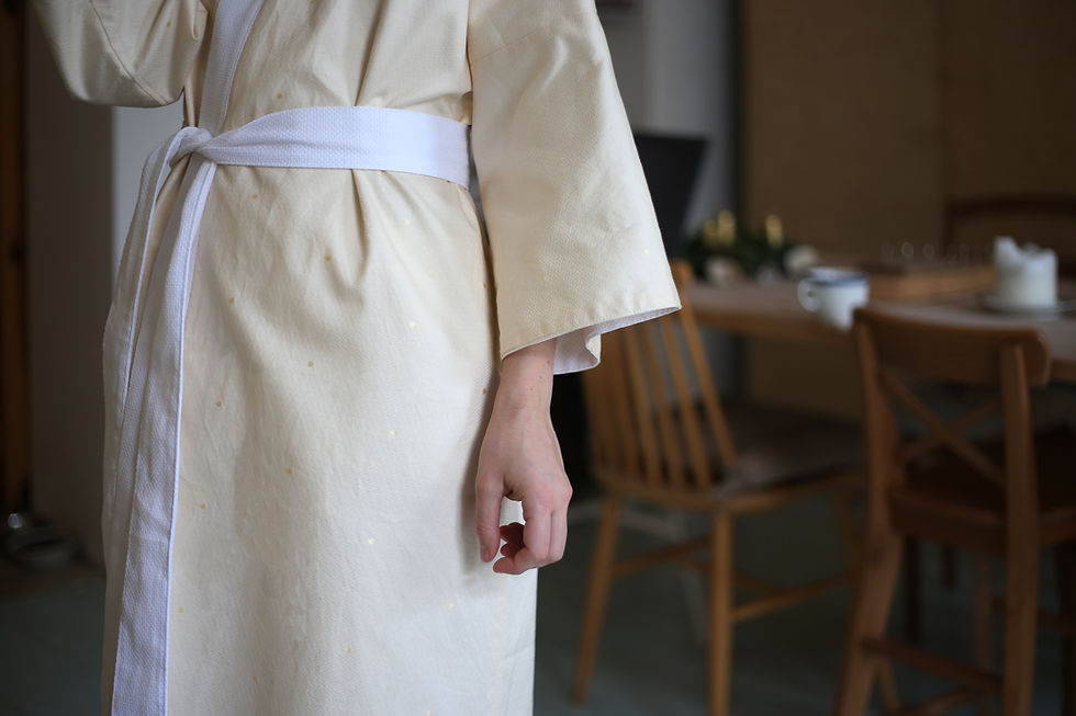 Detil rukávu oboustranného županu