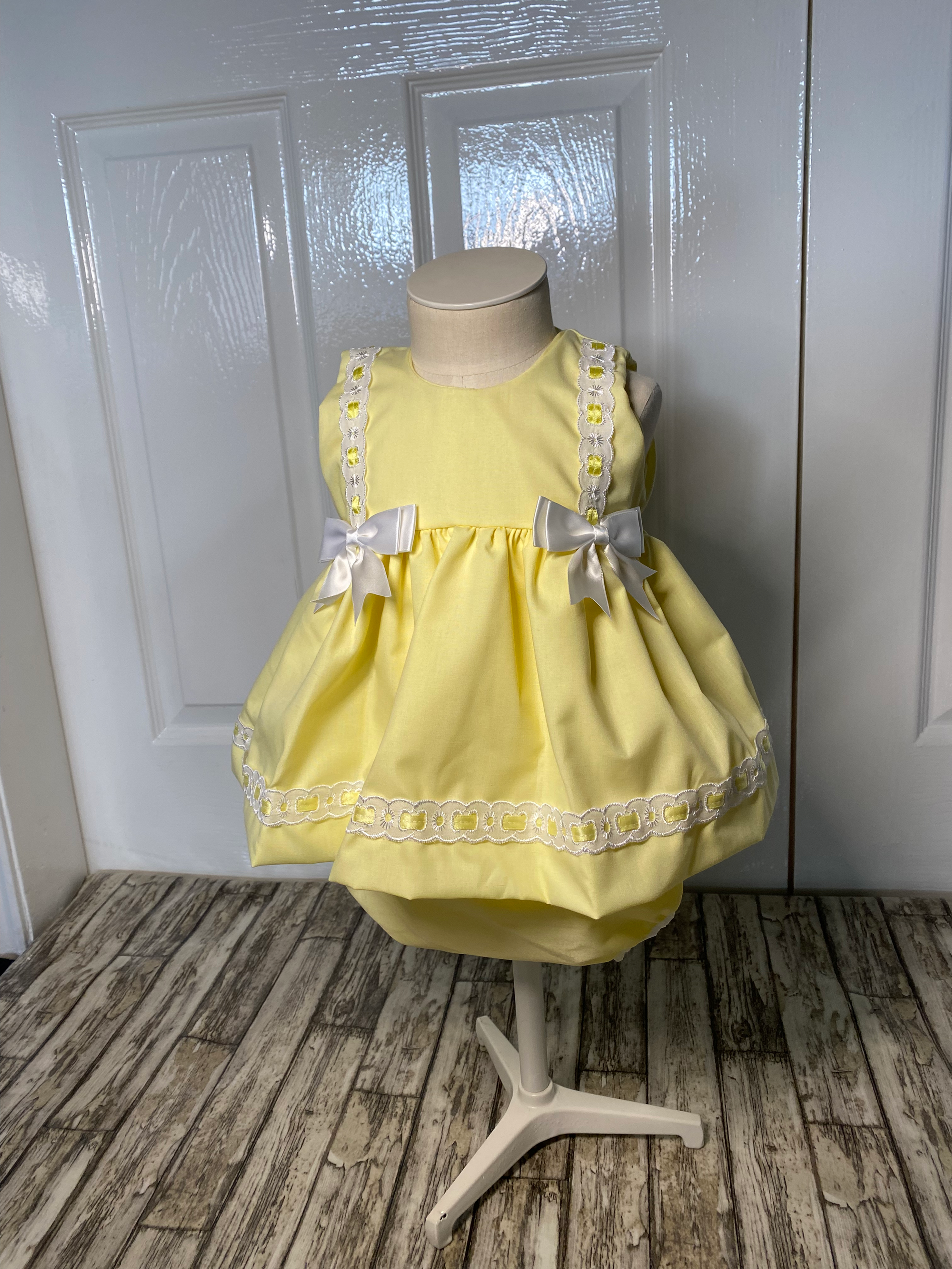 Yellow A-line dress and frilly pants 