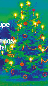 A decorated Christmas tree with festive lights stands in front of a forest. From the side, Santa Claus looks towards the viewer. Everything is colored in an IR color scheme. Next to the cantaloipe logo are the Christmas greetings "Wish you a merry Christmas and a succefull 2026"