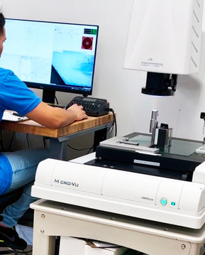 Micro-Vu vision system performing precision optical inspection at Atomic Machine in Naples, FL