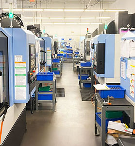 Vertical Mills in operation at Atomic Machine's manufacturing facility in Naples, FL