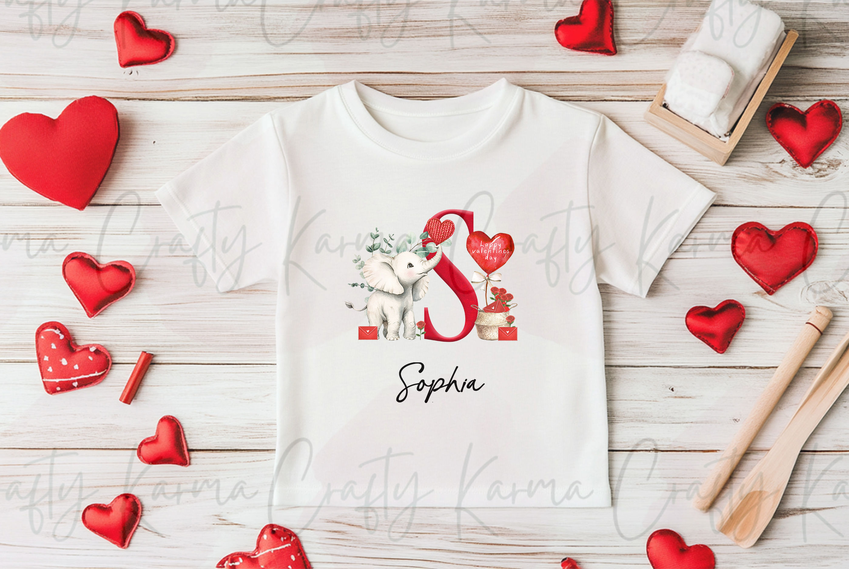 Elephant with initial and heart balloon