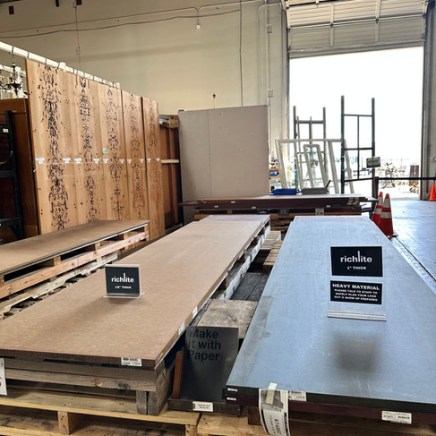 Pallets of Richlite of an assortment of colors at Second Use 