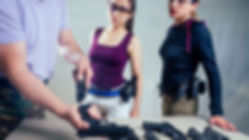 A-woman-target-practicing-with-a-handgun-for-self-defense.jpg