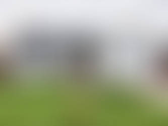 Home inspection report and flashlight on a kitchen counter before calling a contractor