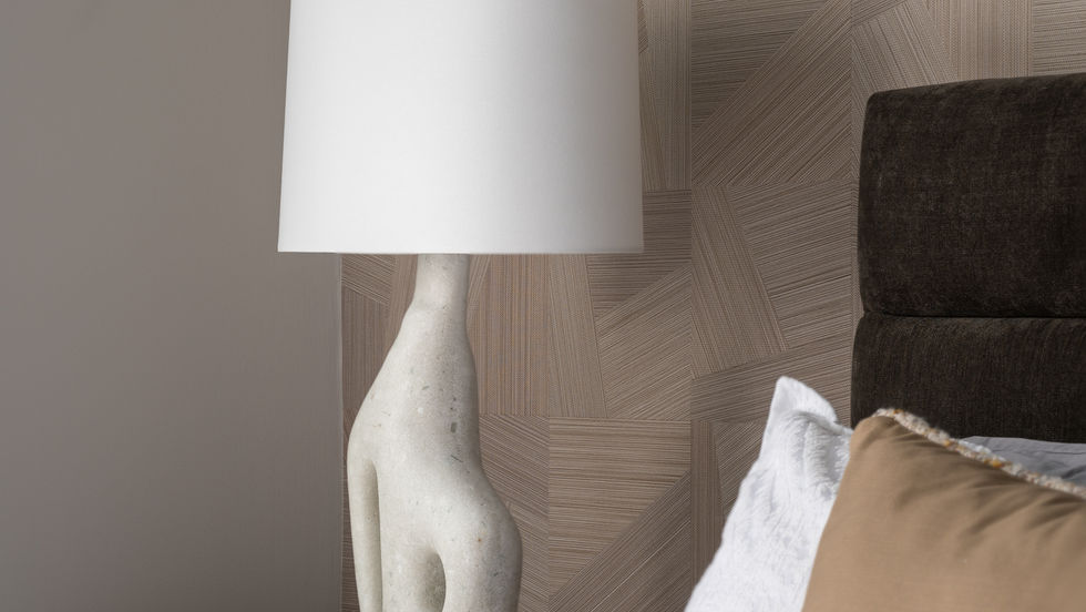 Modern bedside lamp on a wooden nightstand.