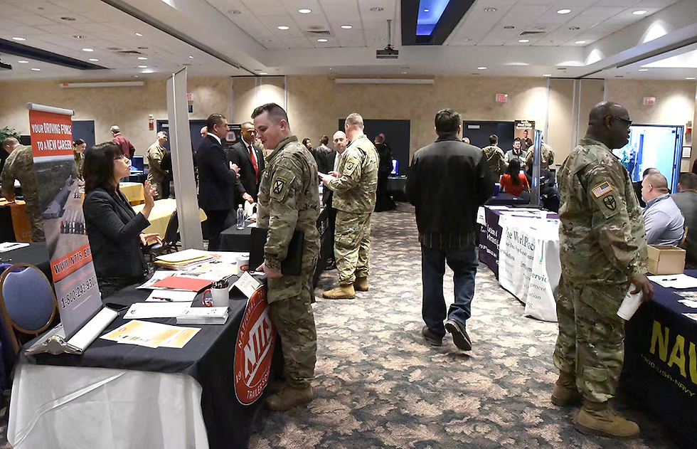 Soldiers, veterans and family members speak with employers during a Fort Drum Soldier for Life – Transition Assistance Program career fair. (Mike Strasser/Fort Drum Garrison Public Affairs)
