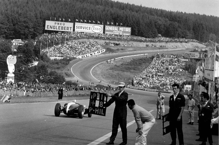 Phil Hill racing at the 1960 Belgian Grand Prix circuit.