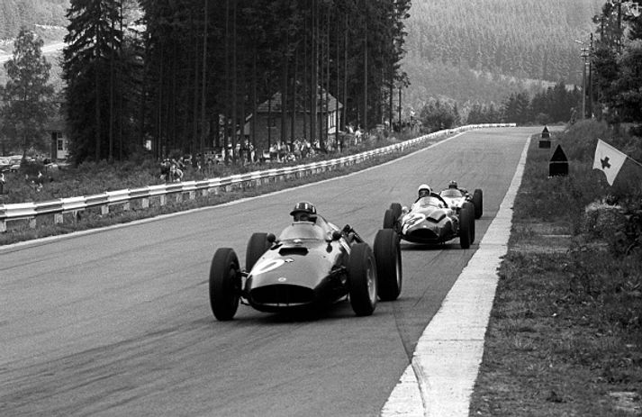 Vintage F1 cars at the 1960 Belgian Grand Prix.