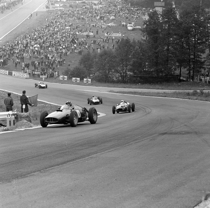 Race cars on track at the 1959 Dutch Grand Prix.