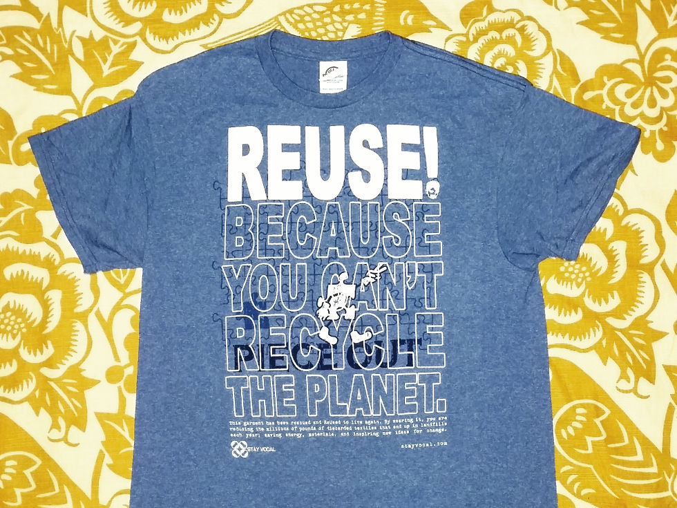 Blue T-Shirt that says REUSE! Because You Can't Recycle The Planet with a jigsaw puzzle piece that says Piece Out.