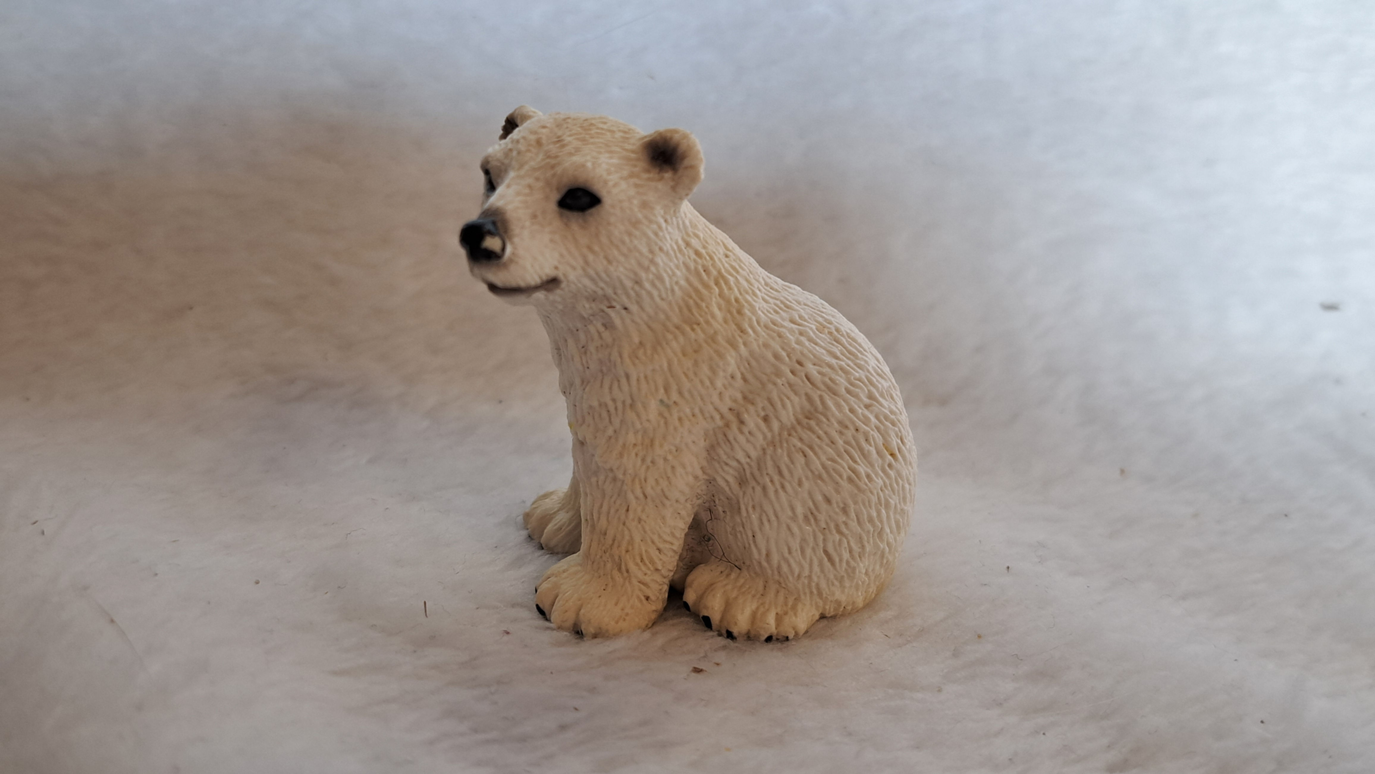 Schleich Eisbärjunges sitzend  - 14660