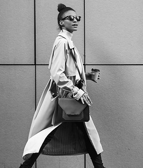 A woman in a coat walking_edited.jpg