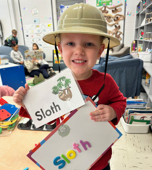 Magic circle preschool early litteracy, young boy, letters