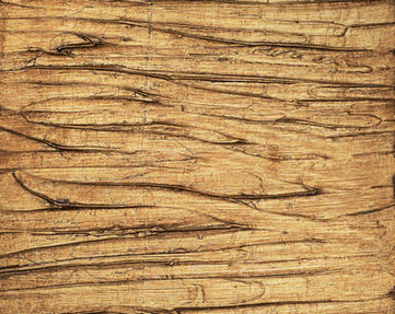 Feuille d'or sur enduit décoratif