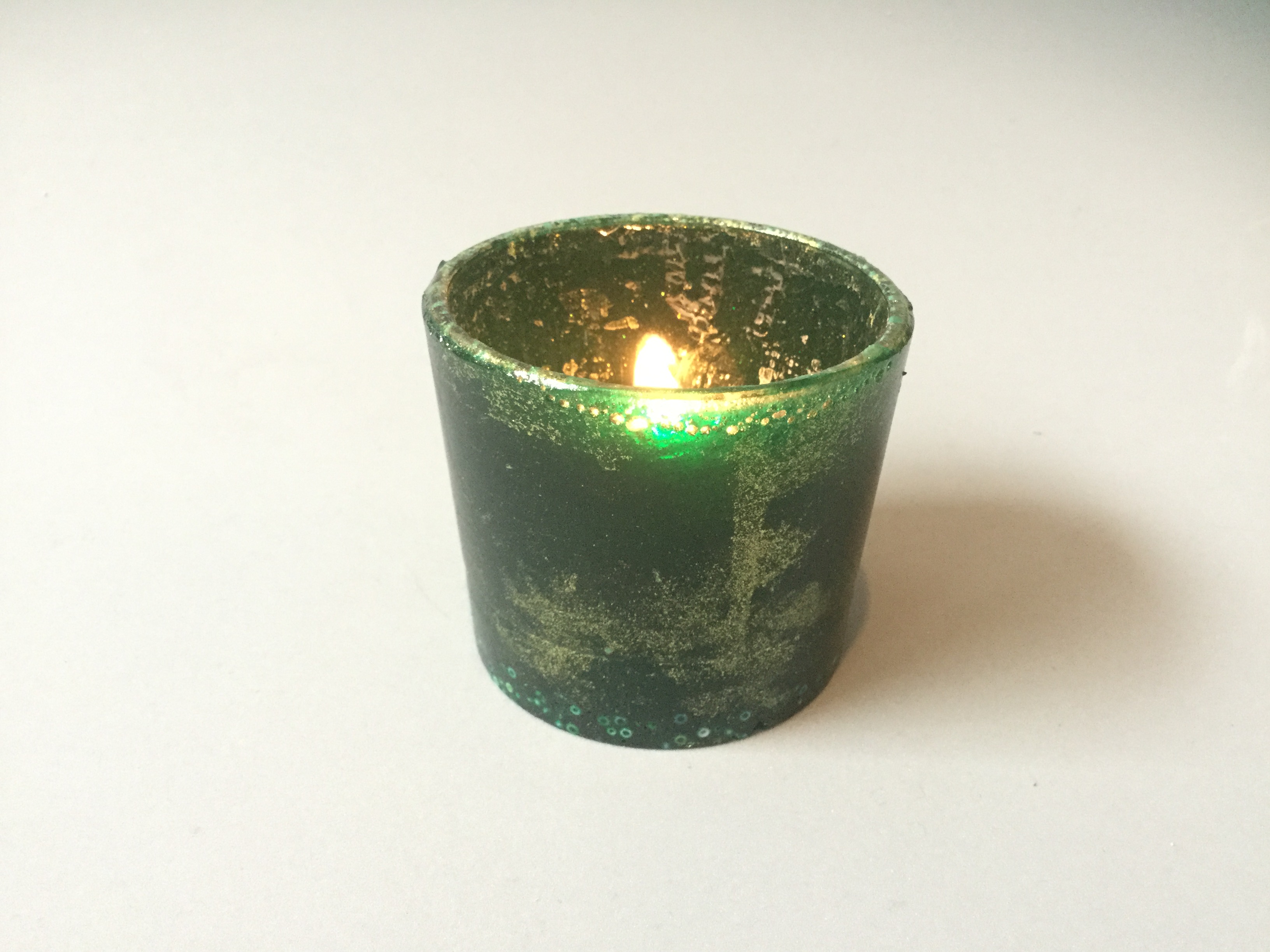 Groene theelichthouder