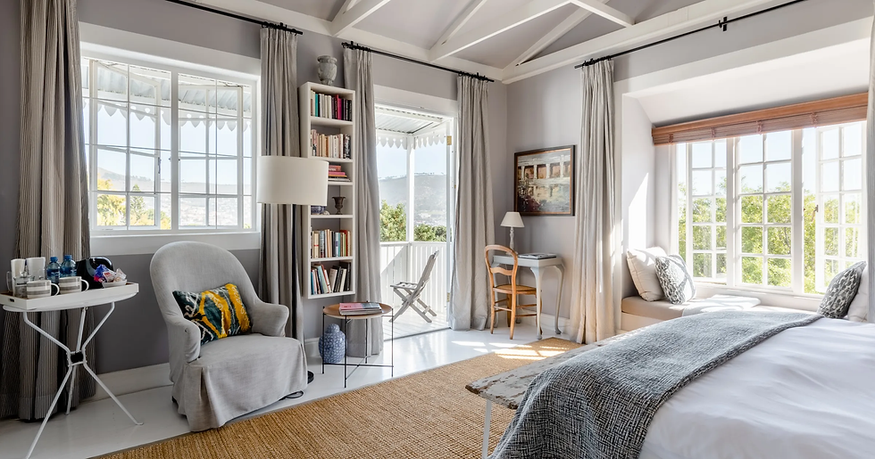 A bed with safety exits in an Airbnb